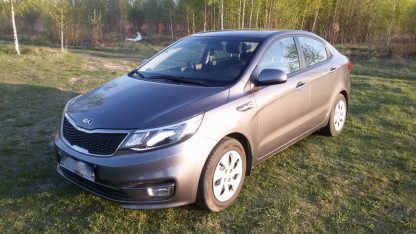 Kia Rio 1.4 л АТ 2014 Темно-серый